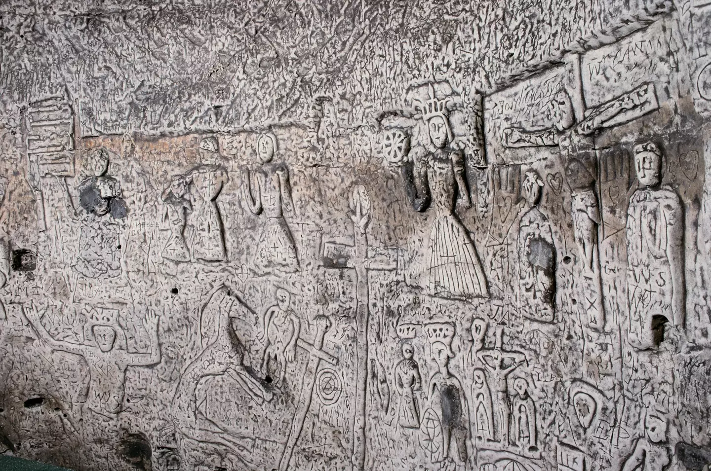 The intricate carvings on the walls of the Royston Cave.