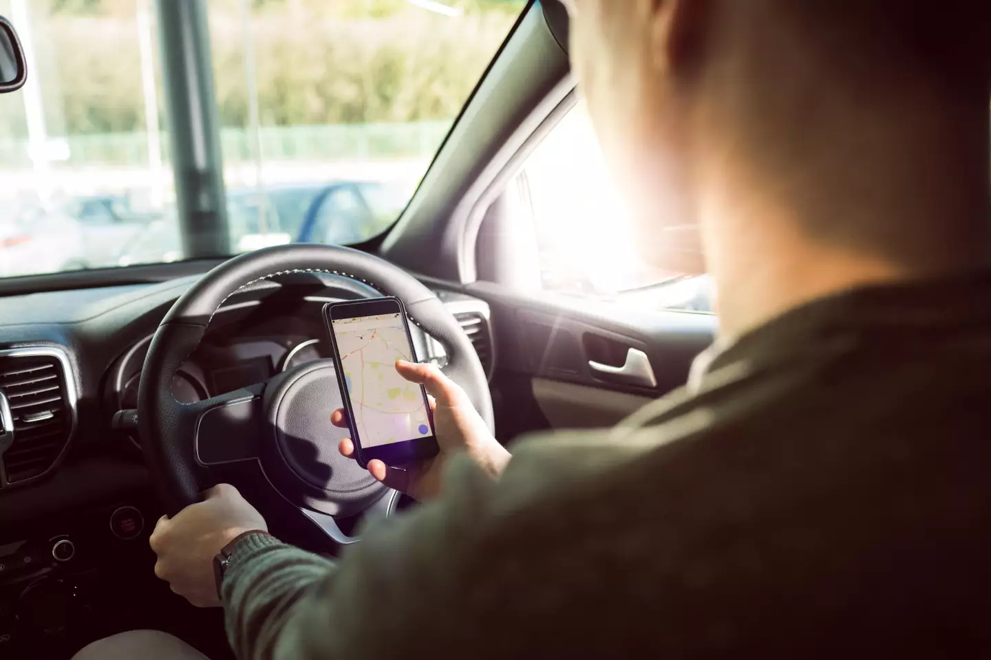 You shouldn't be on your phone in the car, but that's harder to do when it's screaming at you.