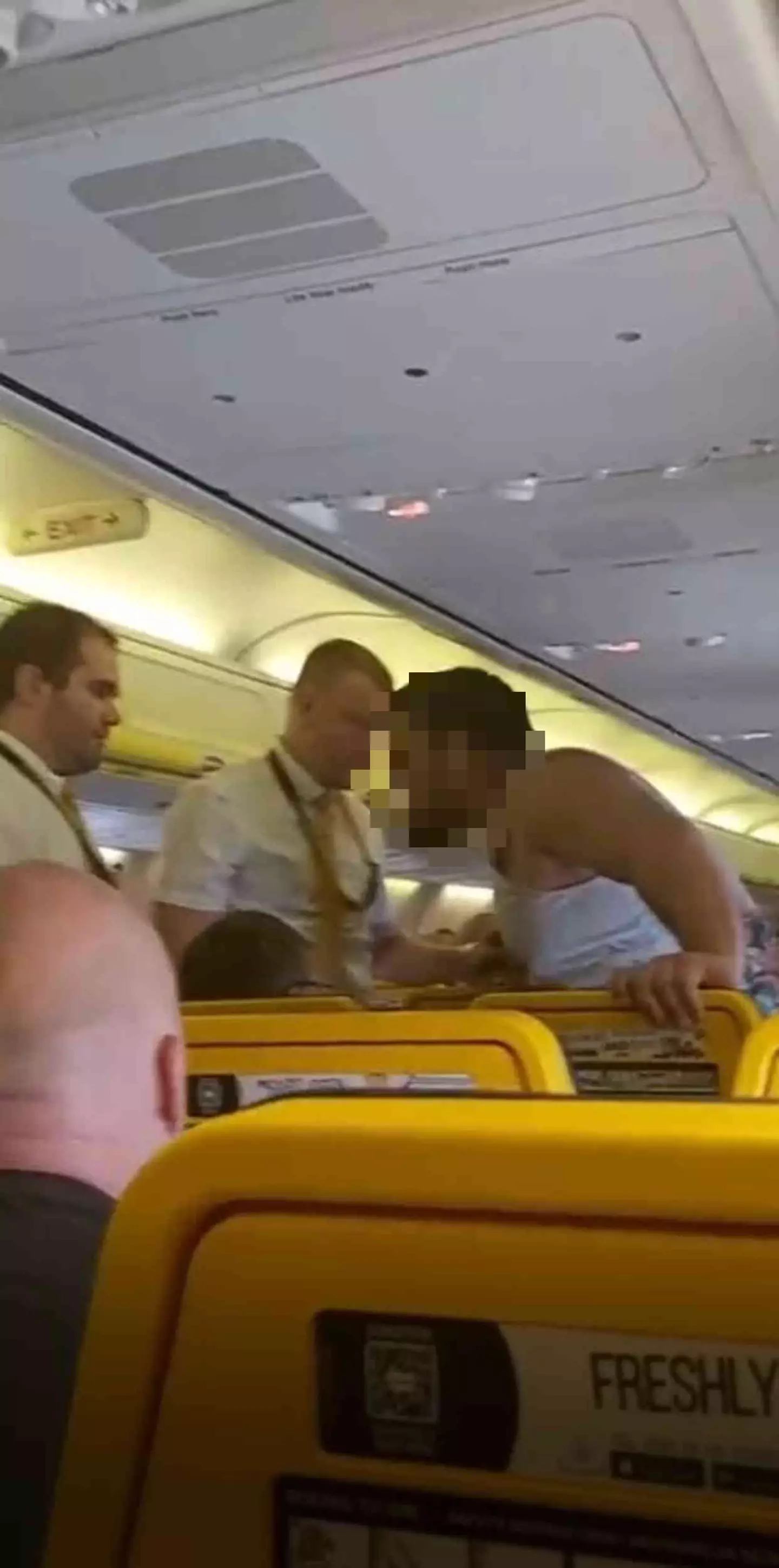Passengers had to restrain him and perform a 'citizens arrest'.