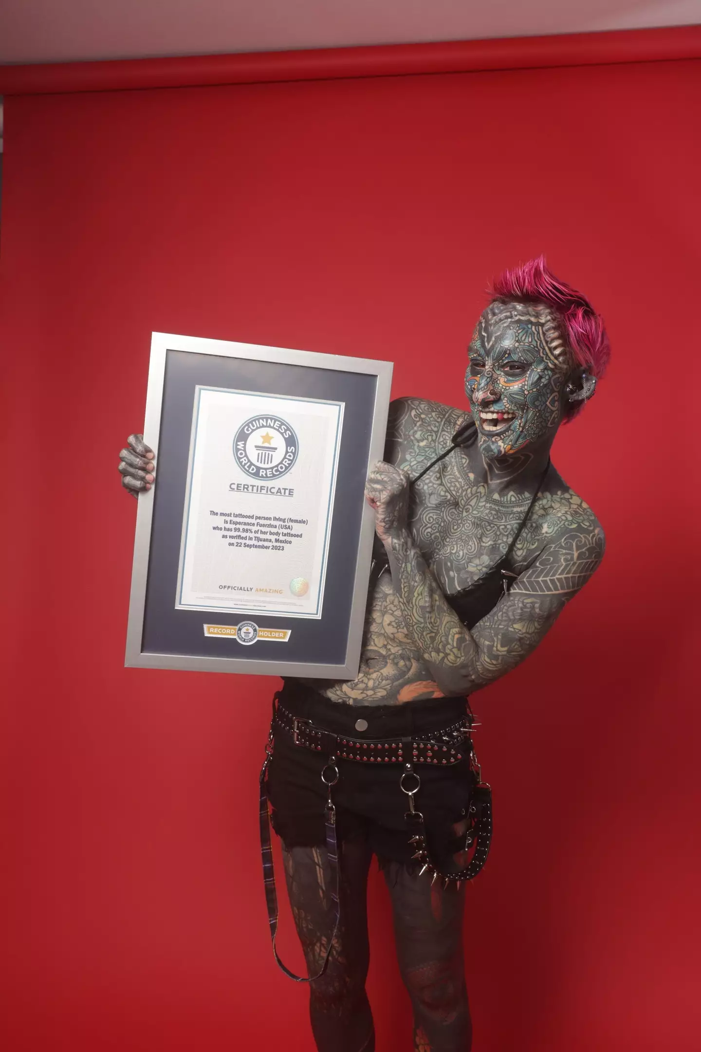 Esperance Fuerzina is the world's most tattooed woman, and the woman with the most body modifications. (SWNS)