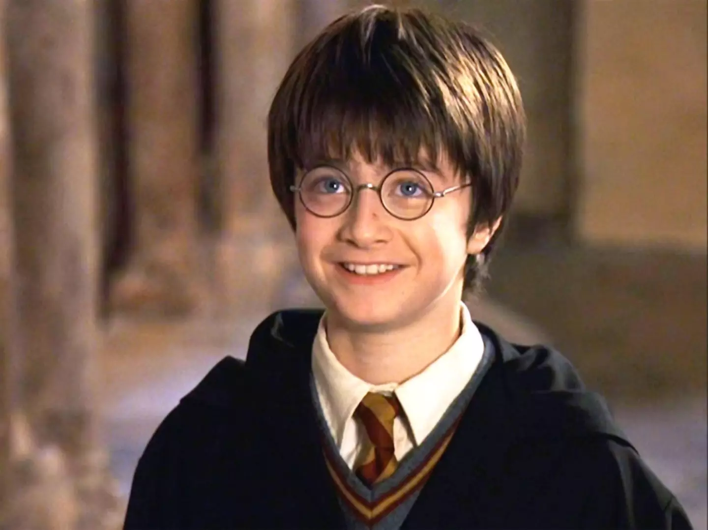 A baby-face Daniel Radcliffe playing Harry Potter in the Philosopher's Stone.