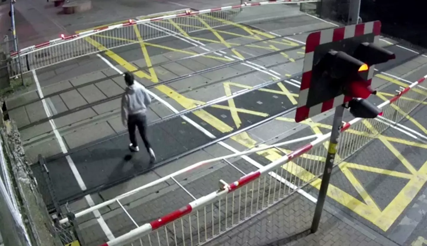 The train missed him by mere seconds.