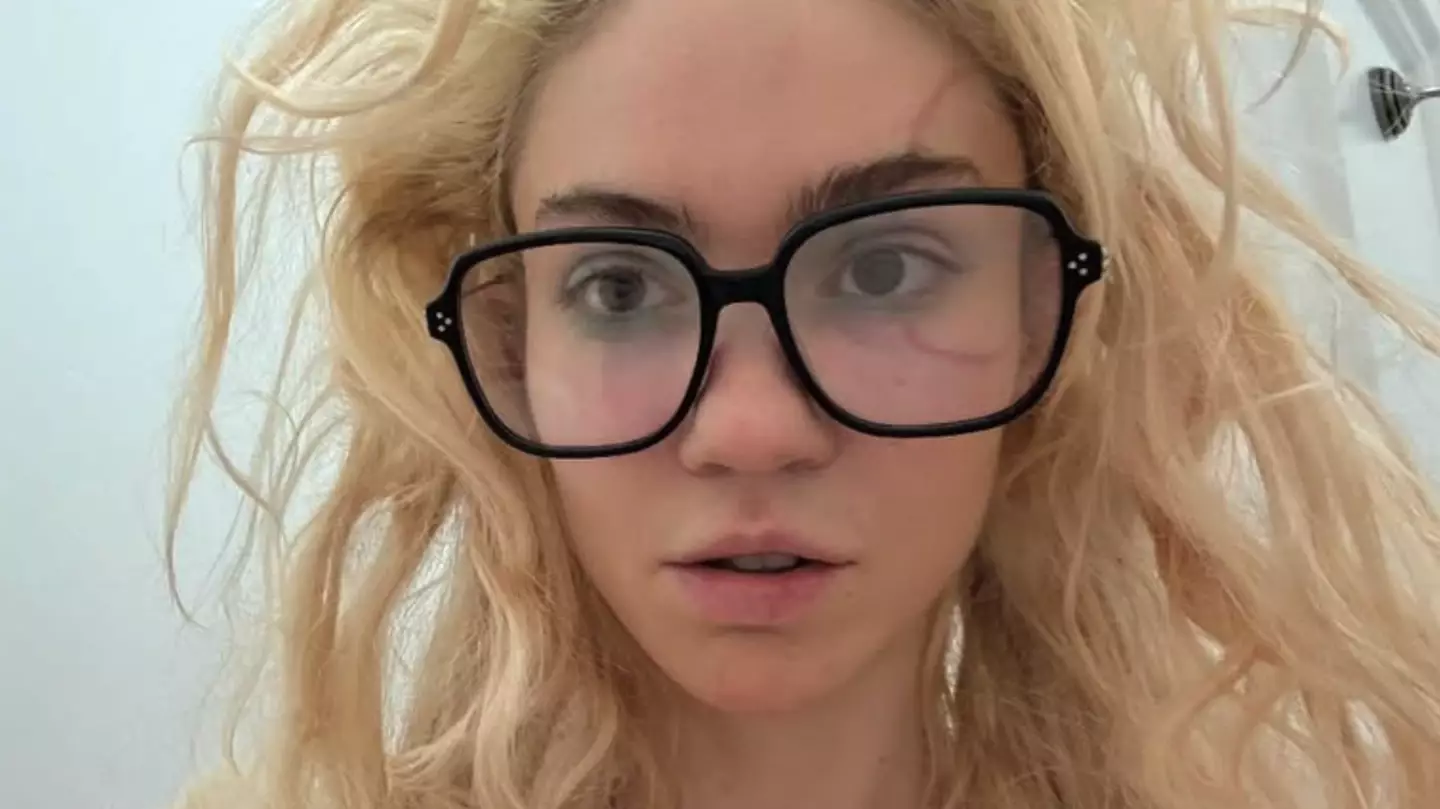 Elon Musk’s ex Grimes divides fans with new face tattoo she’s ‘waited 10 years for’