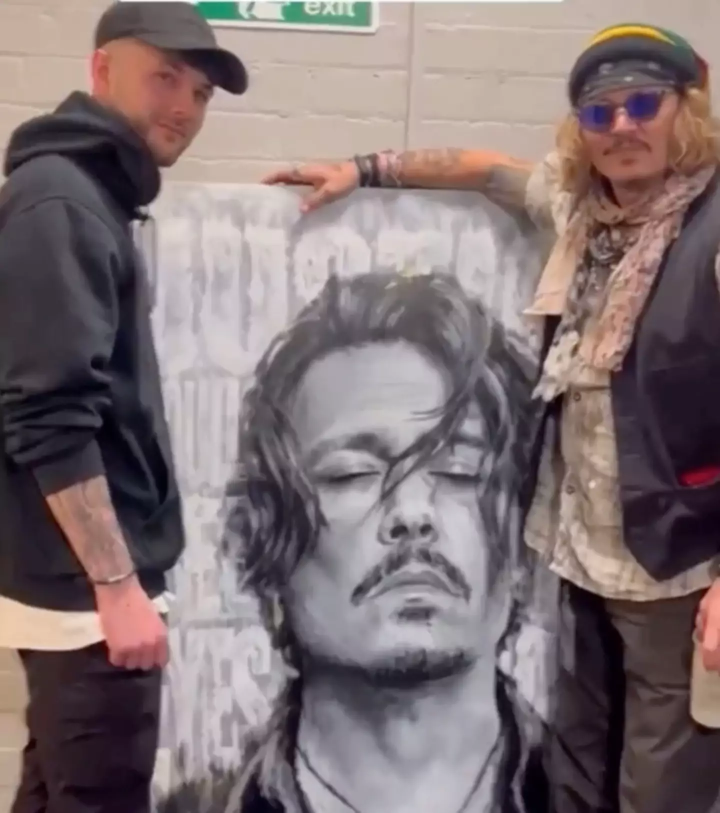 Johnny Depp thanked fans after he was handed a painting.