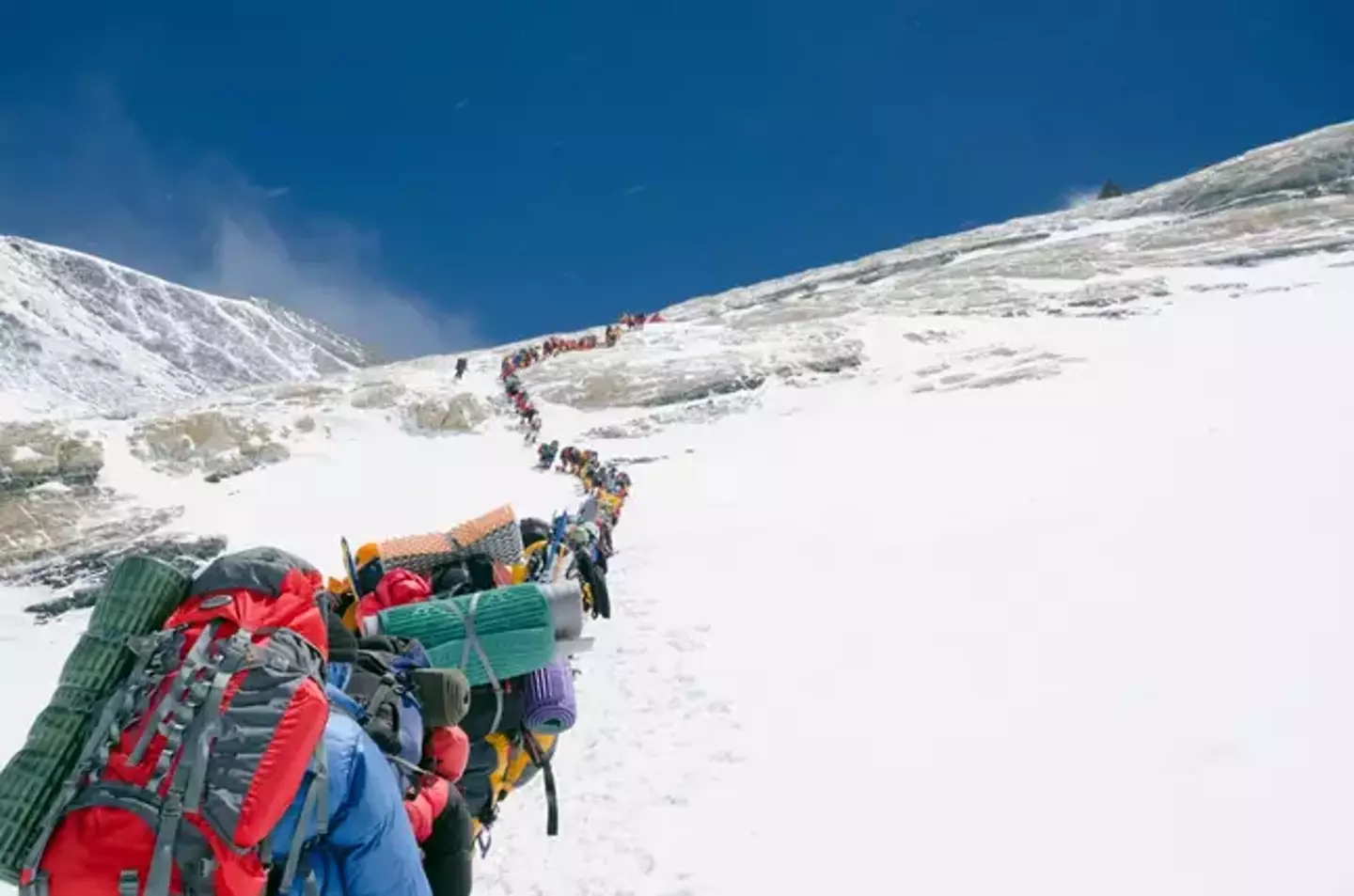 Dead bodies are left on the mountain as a warning to other climbers, and because it's so difficult to get someone down.