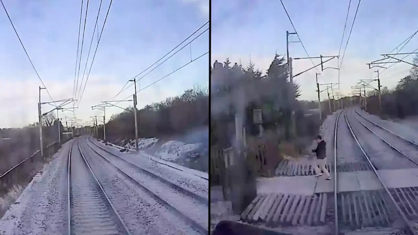 Alarming video shows moment man is nearly hit by a train as he crosses tracks