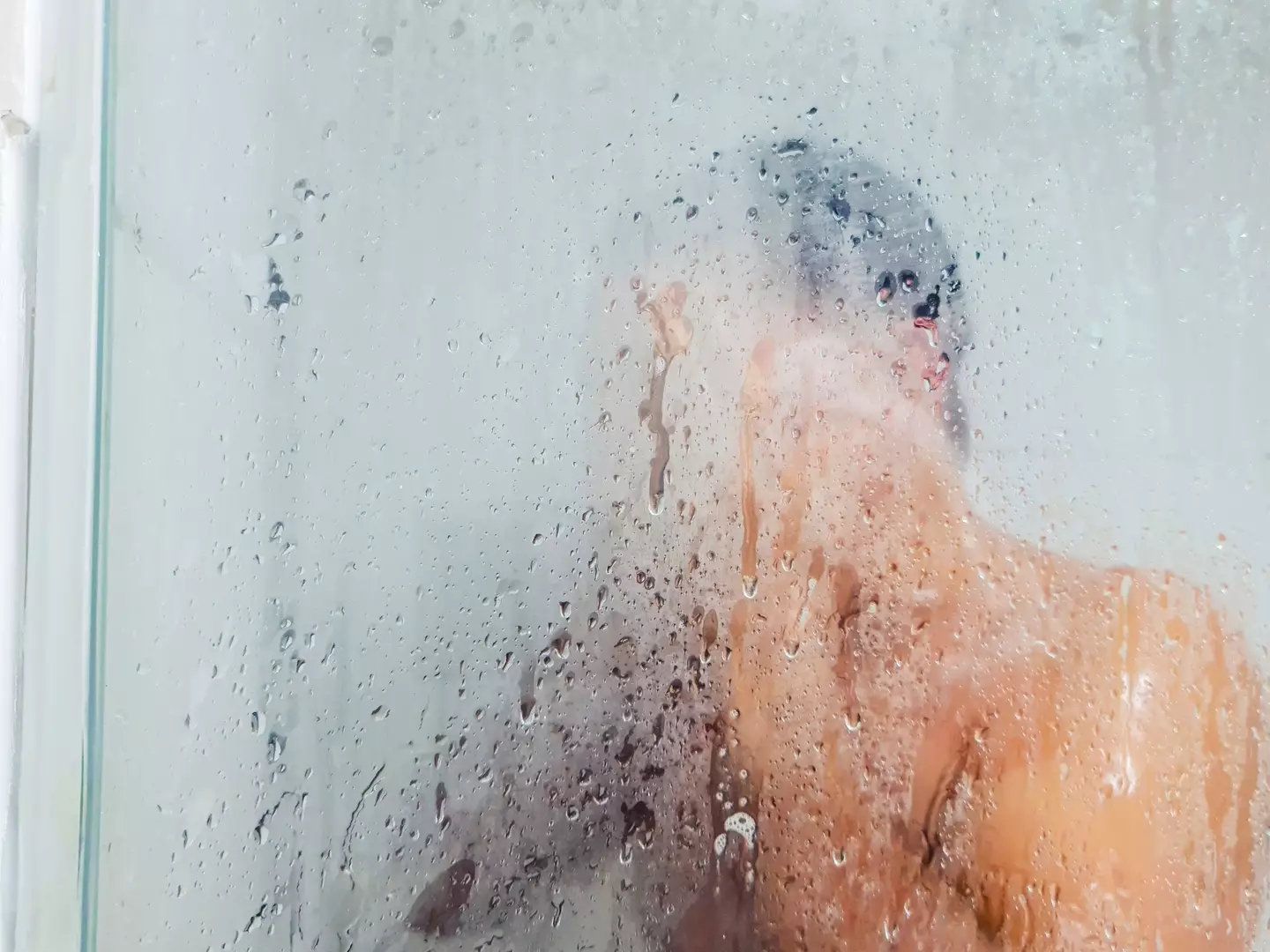 Unless you're scalding your scalp your hot shower won't give you permanent hair loss, but it can make hair more brittle (Getty Stock Photo)