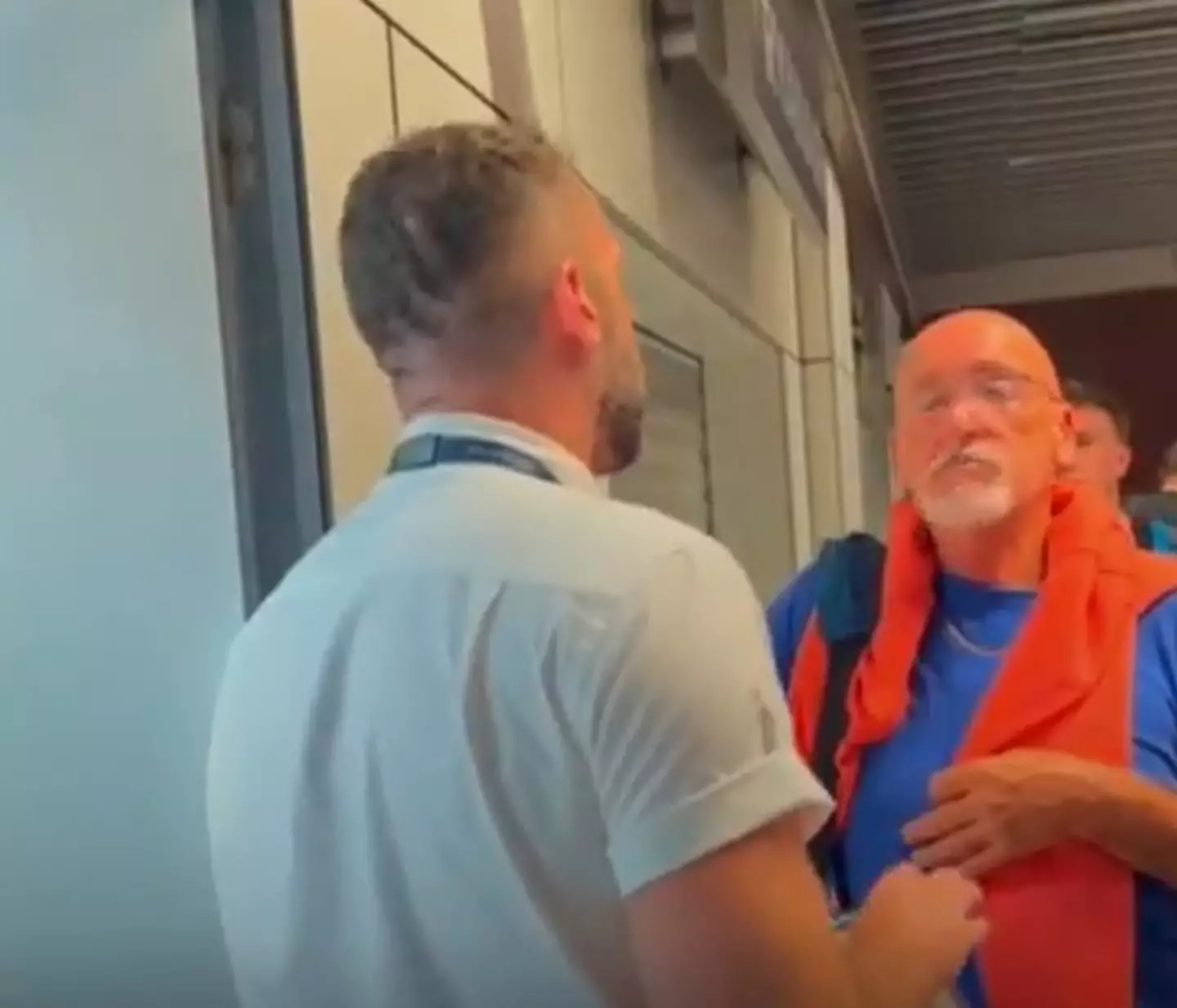 Ryanair passengers were seen arguing with airport staff as they tried to get home.