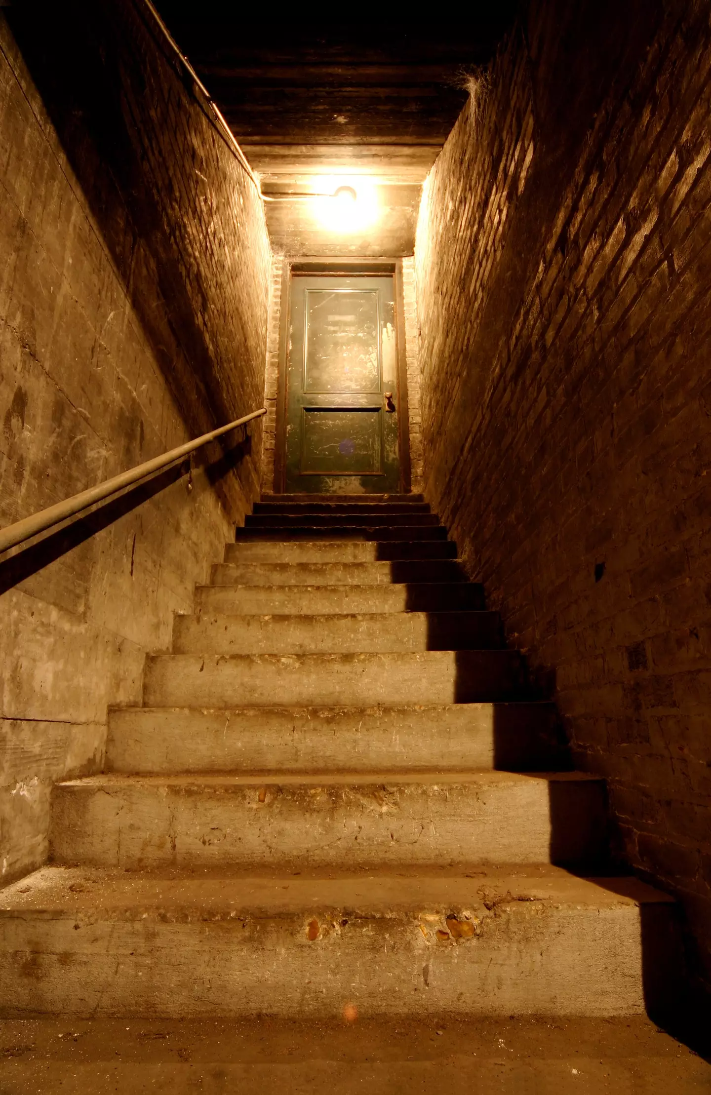 Couple share creepy footage after making chilling discovery under stairs of new home 2 The series leads to a series of chambers and small rooms (Getty Stock Photo)