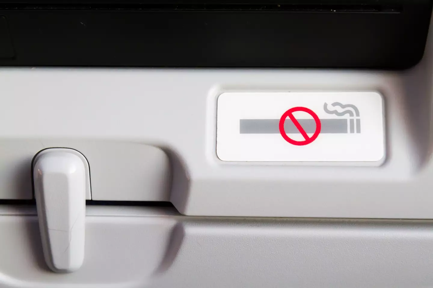 People point out 'absolute mindf*ck' detail following discovery of two old plane boarding passes 2 Smoking is now prohibited on planes (Getty Stock Image)