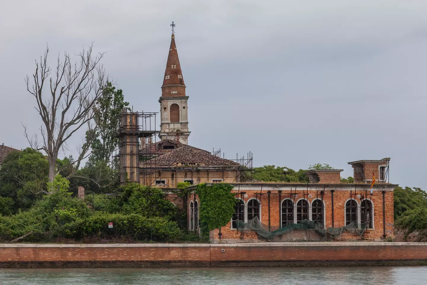 The historic hospital and bell tower, now in a state of disrepair (Marco Di Lauro/Getty Images)