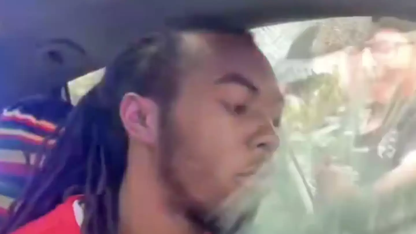 Cop cleared after smashing window and punching suspect in viral video as new angle released