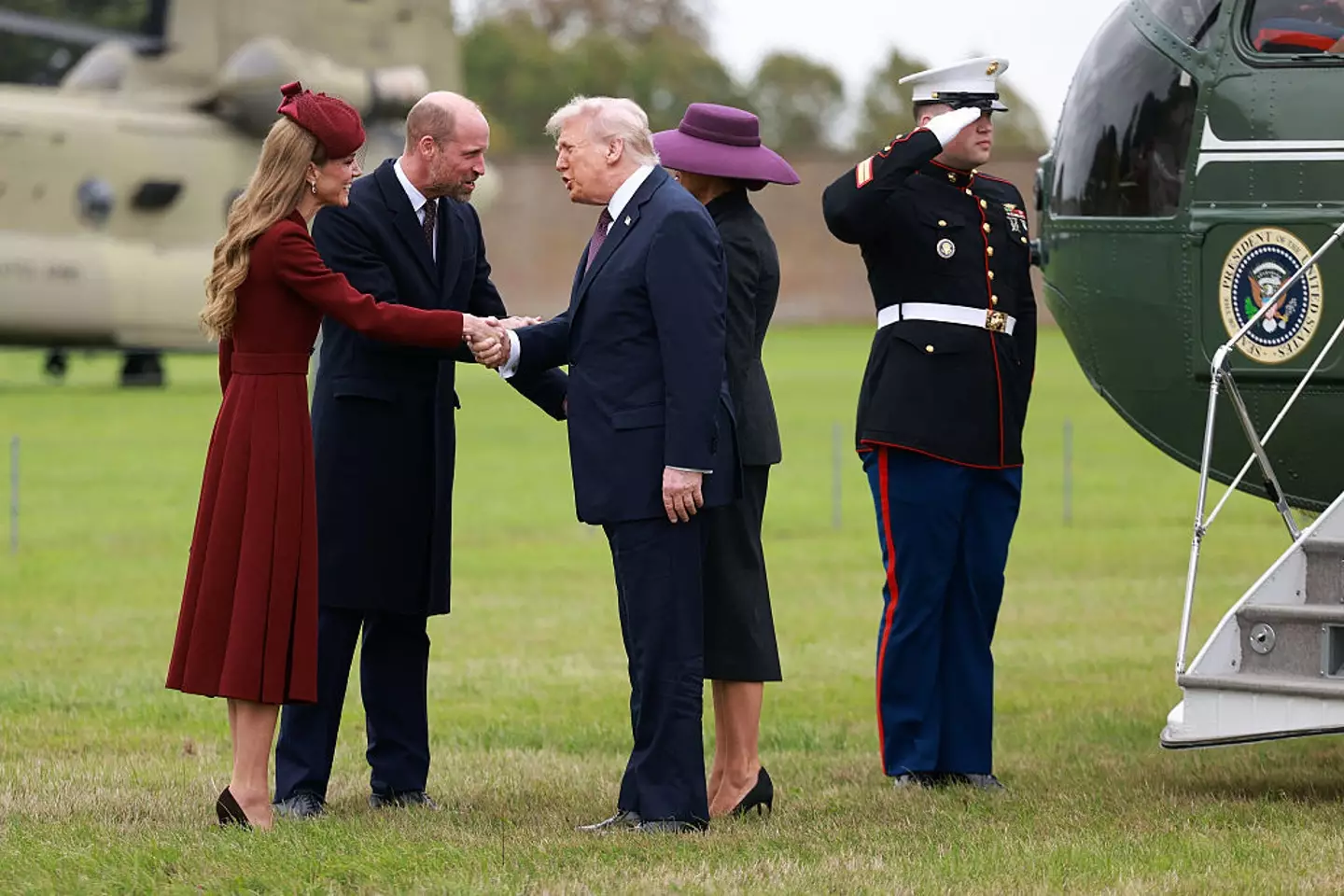 The US president appeared to 'pull' Kate Middleton in for a handshake (IAN VOGLER/POOL/AFP via Getty Images)