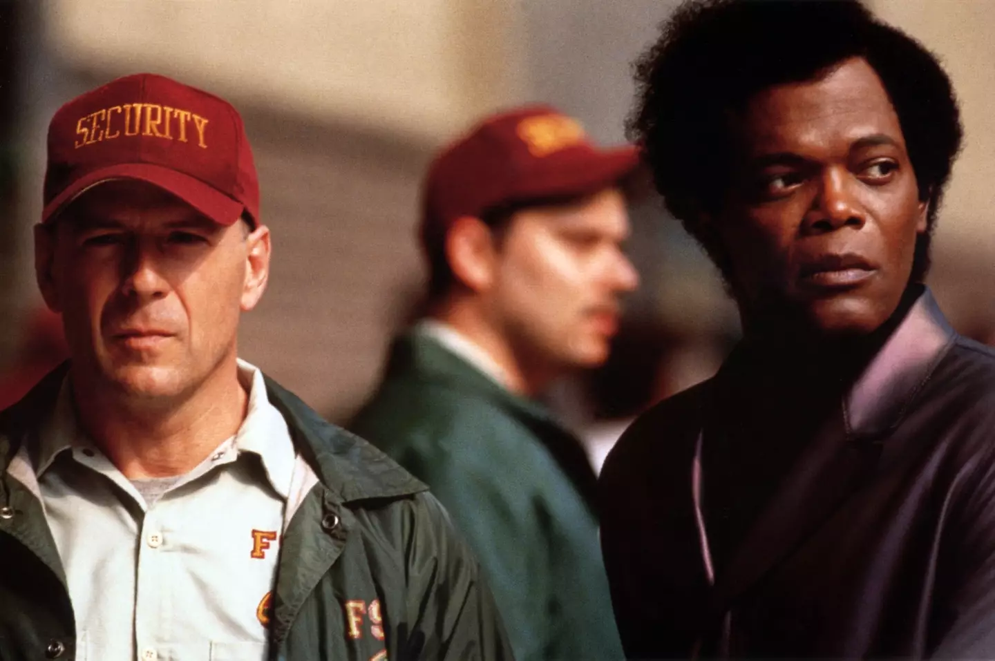 Bruce Willis and Samuel L. Jackson in Unbreakable.