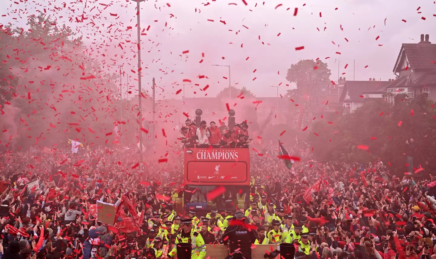 As the parade bus made its way around the city there were crowds of thousands cheering (Andrew Powell/Liverpool FC via Getty Images)