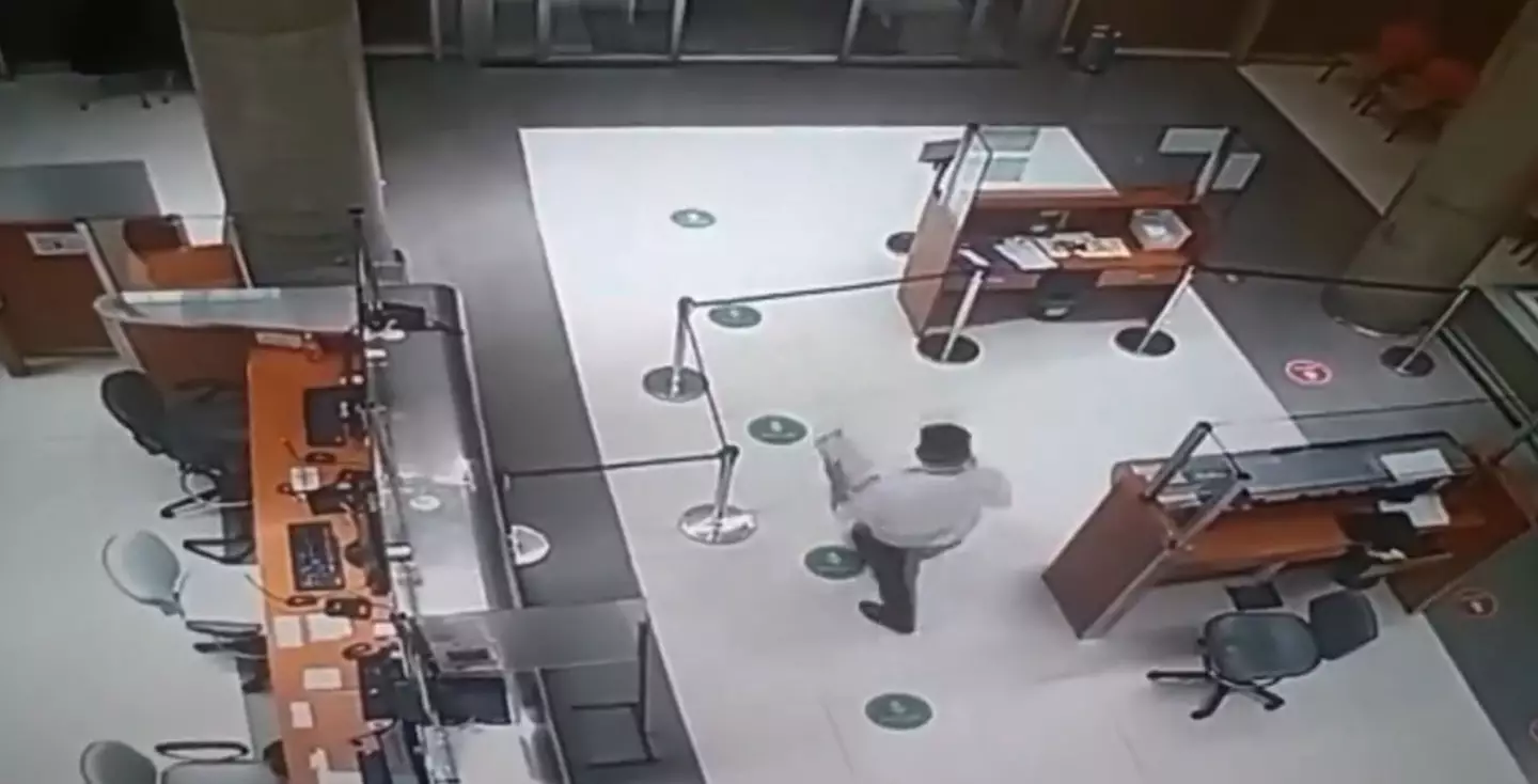 The security guard was talking to thin air.