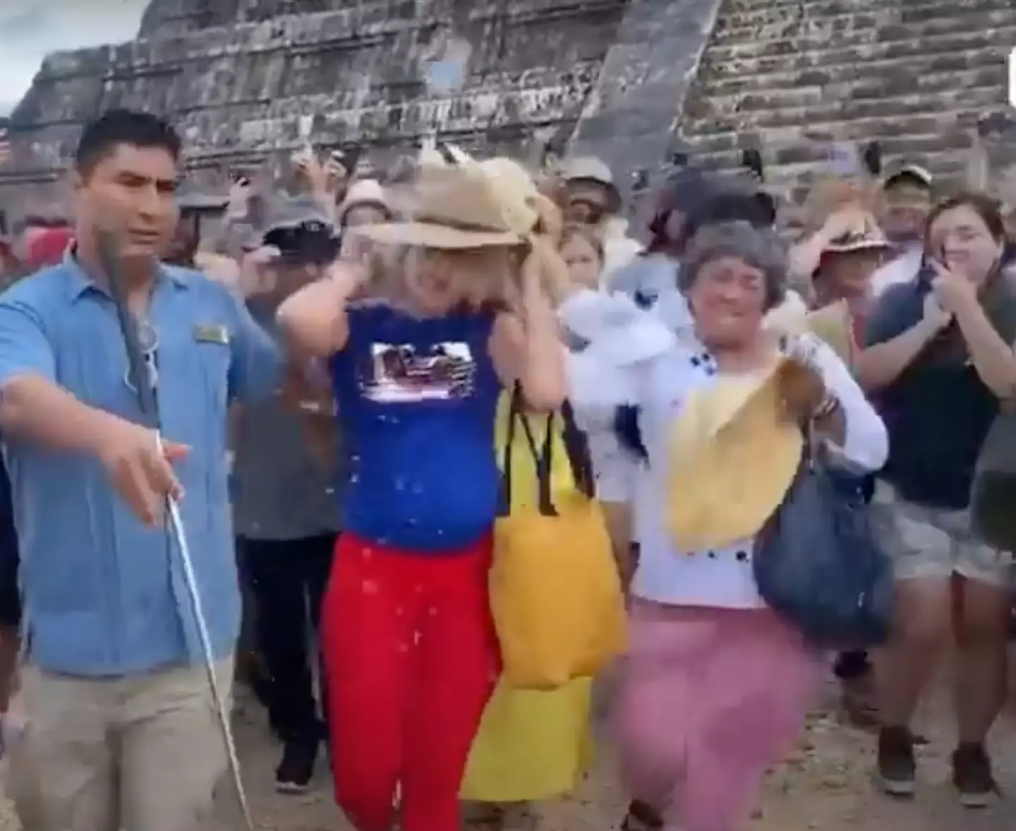 One local grabbed the tourist and shook her in anger.