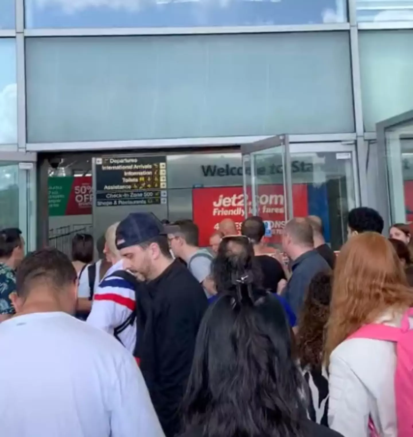 People gather outside.