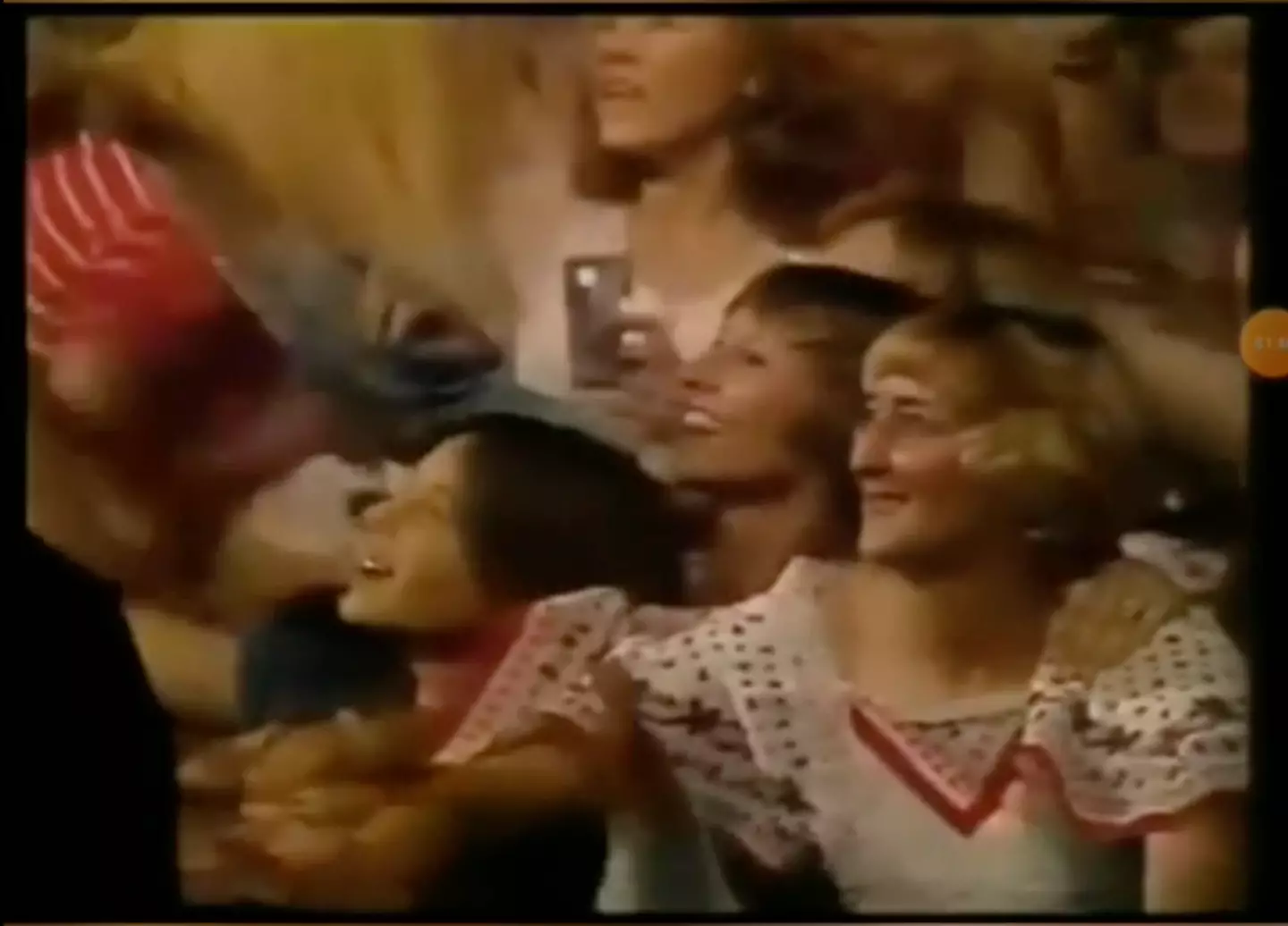 Conspiracy theorists think the woman is holding a phone.