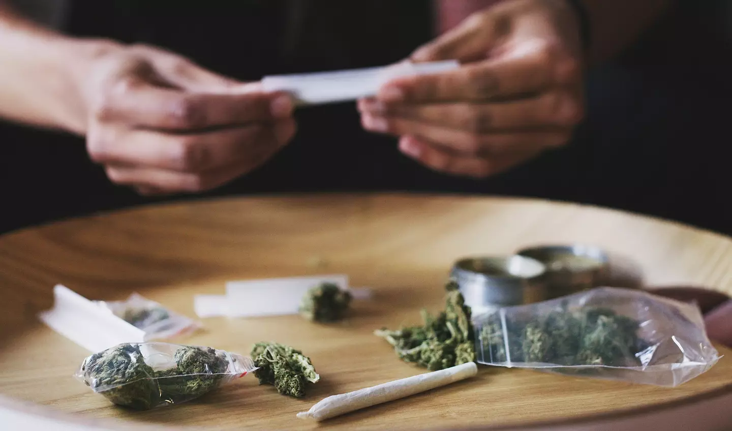 When you smoke weed, THC spreads quickly to the brain via the lungs and over a long-term period, it can lead to deficits in attention, learning and memory (Getty Stock Images)