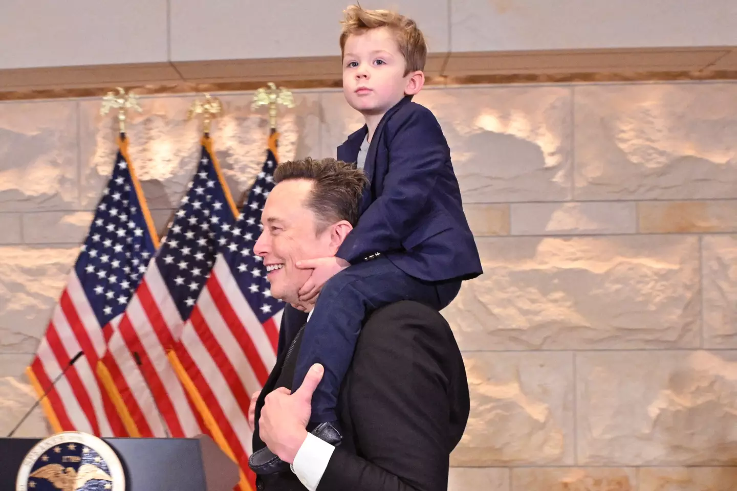 Musk and his son 'X' (ROBERTO SCHMIDT/AFP via Getty Images)