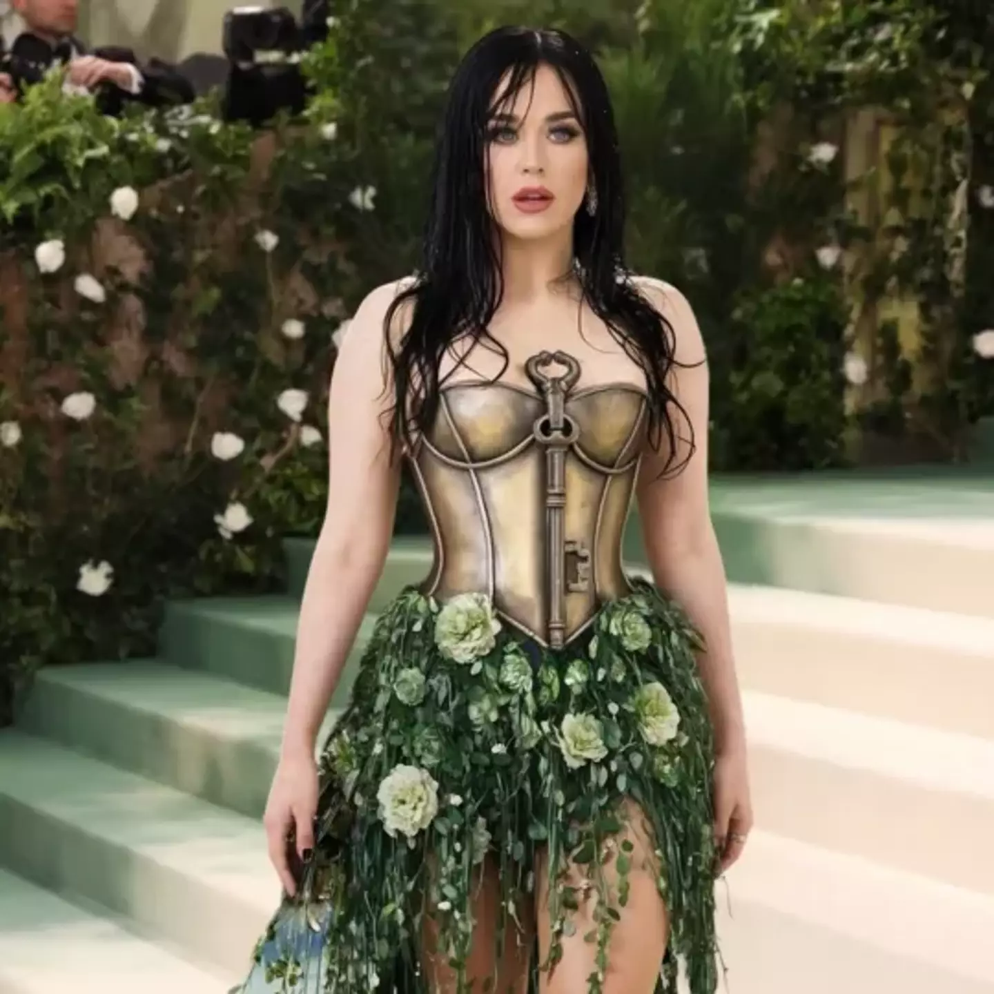 The eyebrow raising attire was AI-generated. (Instagram/@katyperry)