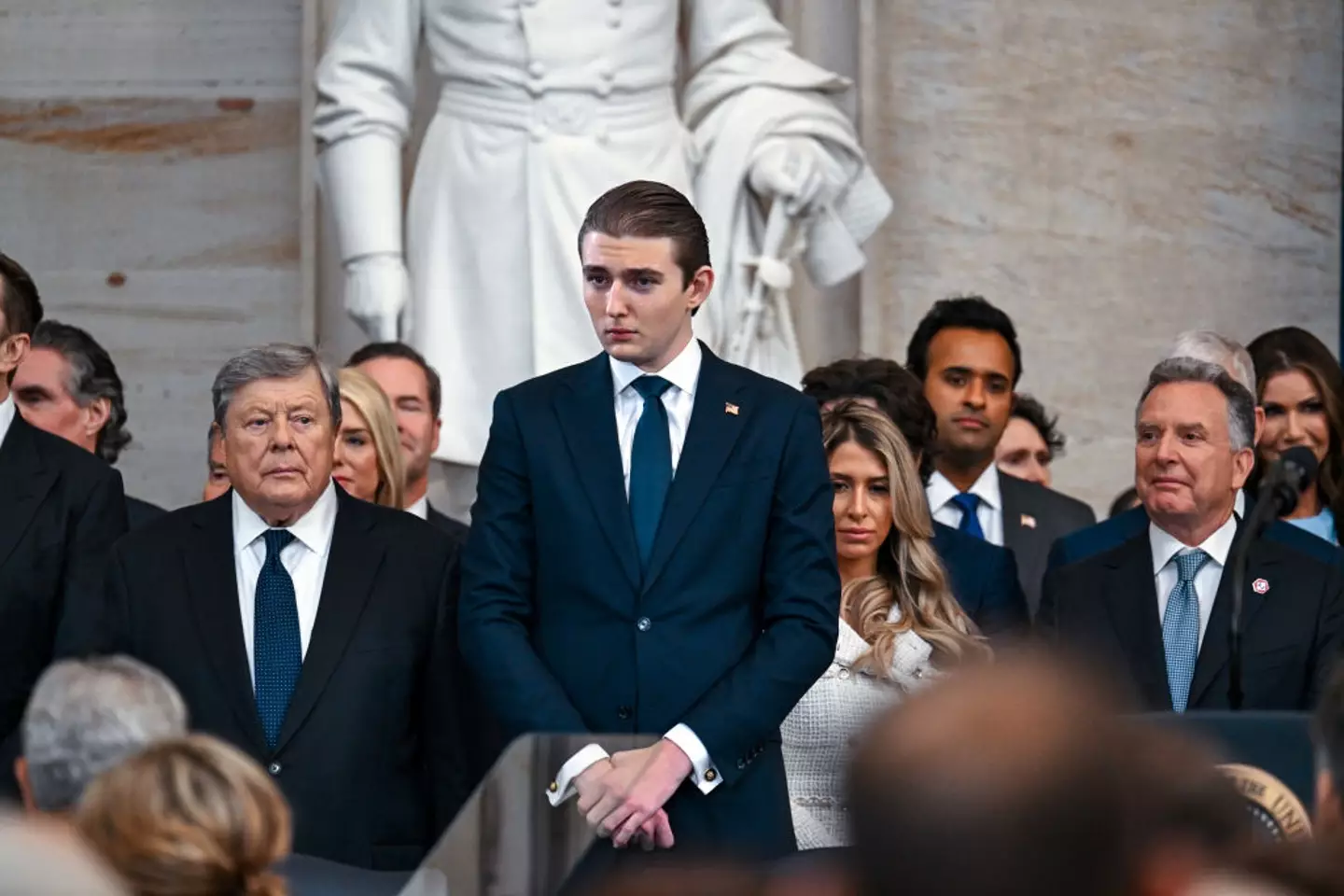 Barron Trump was seen towering over other guests at the inauguration (Kenny Holston-Pool/Getty Images)