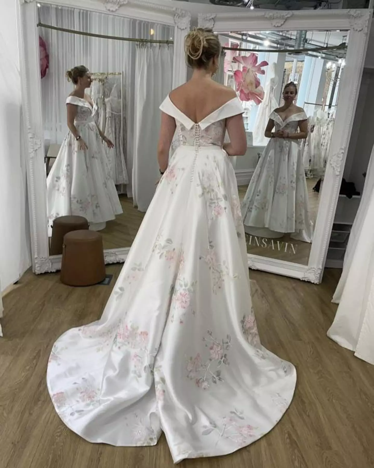 A woman who went wedding dress shopping believes they have accidentally created a 'glitch in the matrix' after her dress showed 'three different realities'.
