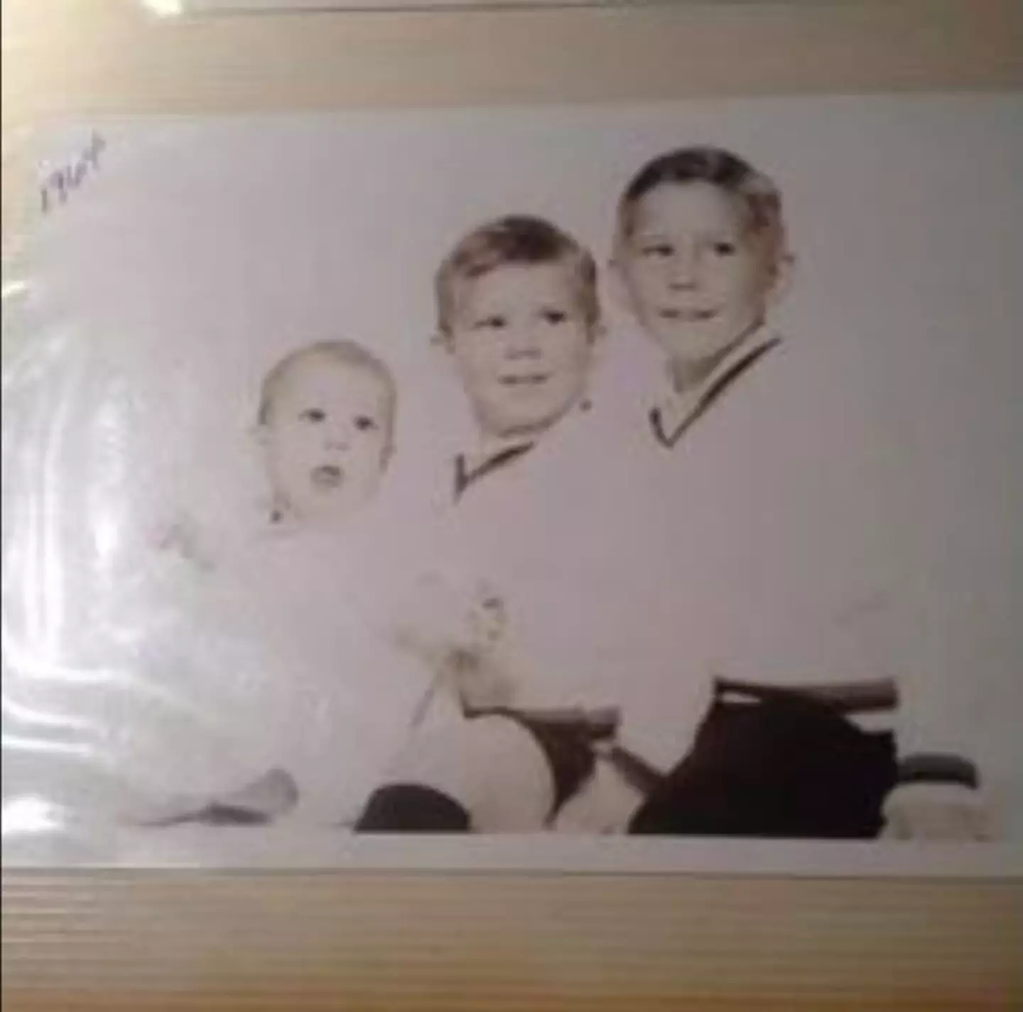 He shared a picture with his real brothers.