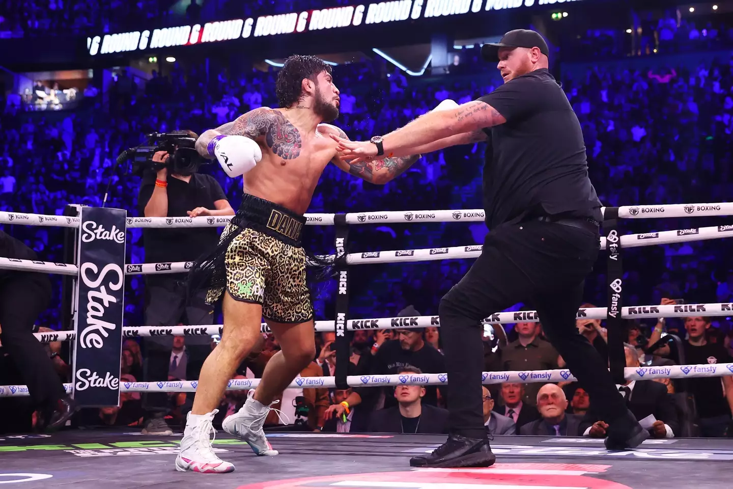 A member of Paul's security ended up having to intervene.