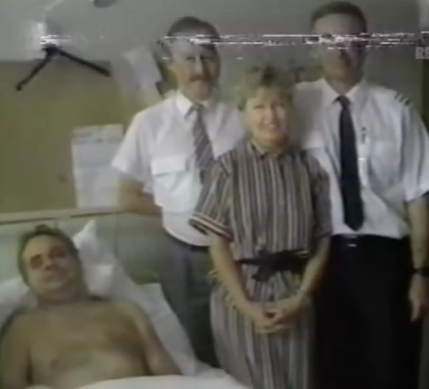 The captain and crew members who helped to save his life (YouTube/Retrontario/NBC News)