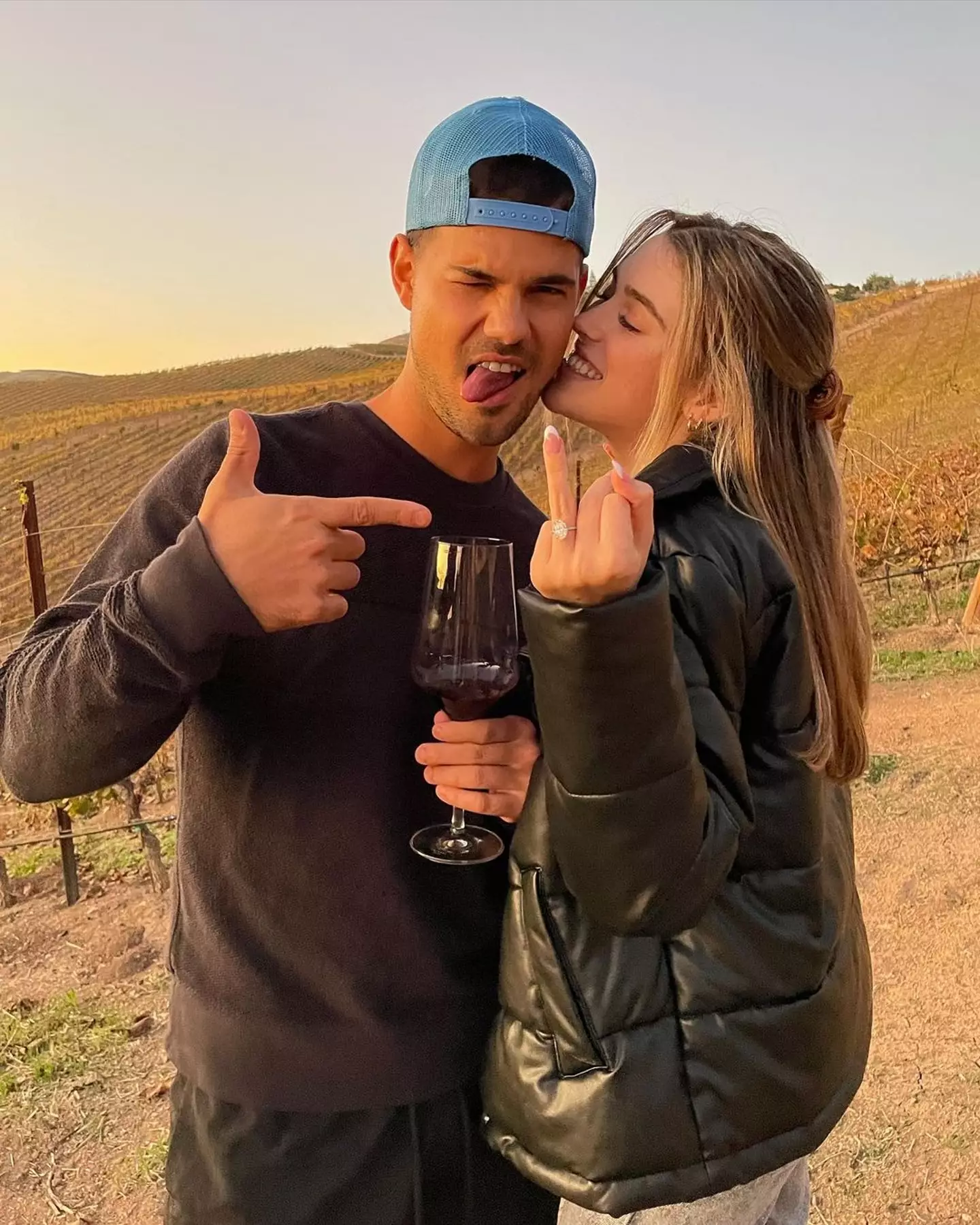 Lautner with fiancee Taylor Dome.