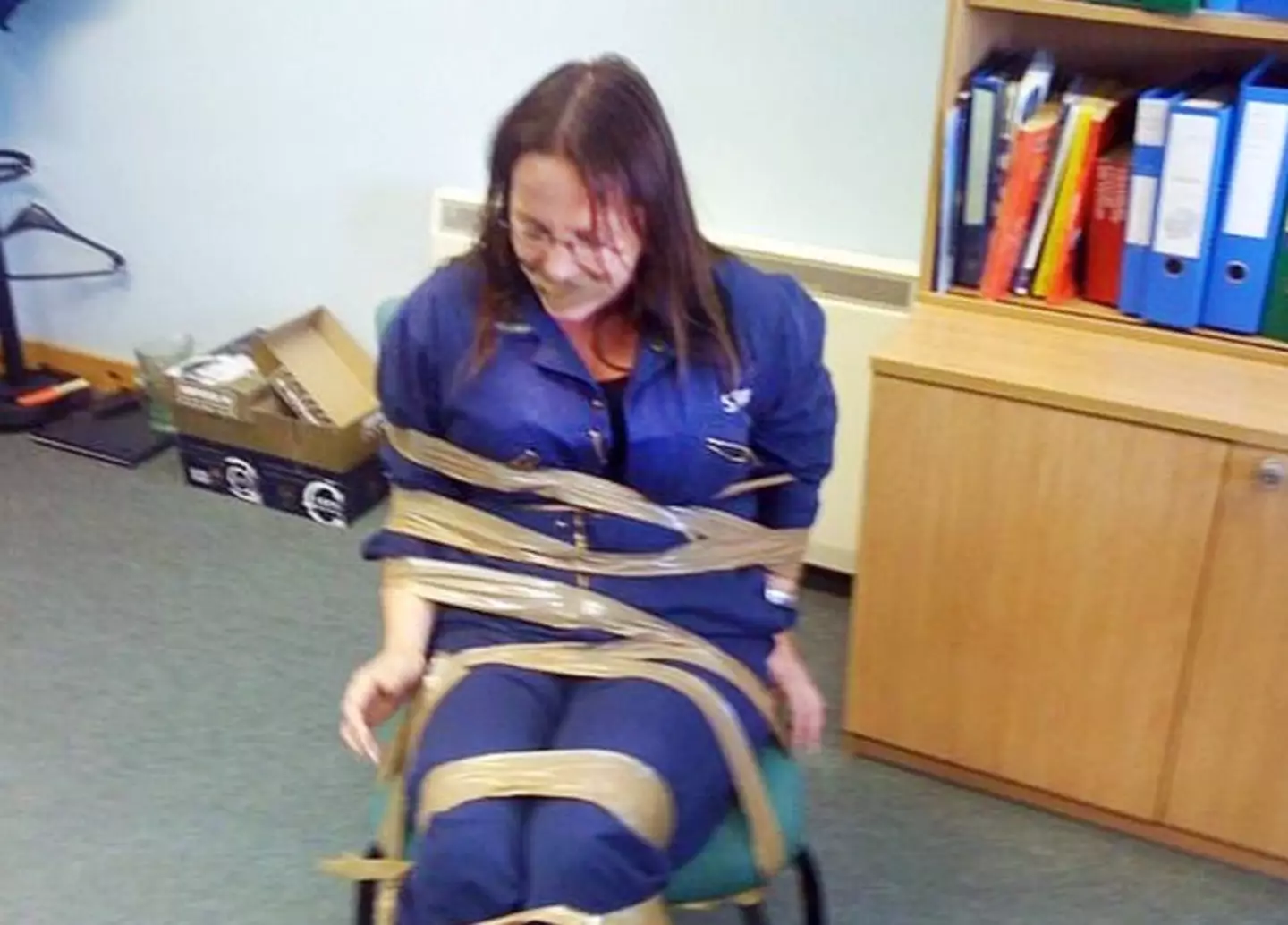 Ms Fitzpatrick was pictured gagged and tied to her chair.