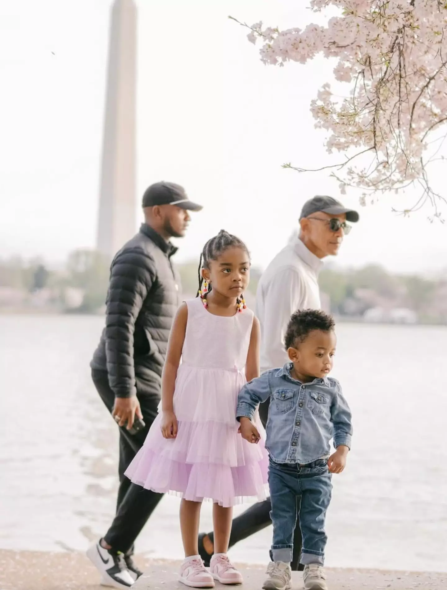 The little ones - and their mother - didn't have a clue that a former President was walking behind them (Instagram/@briannainellphotography)