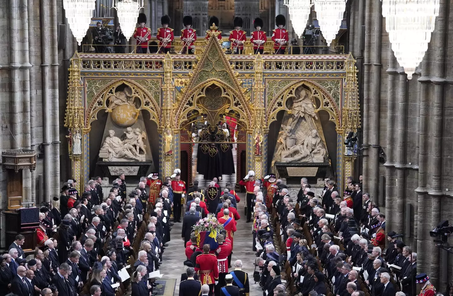 King Charles and members of the royal family following the Queen's remains.