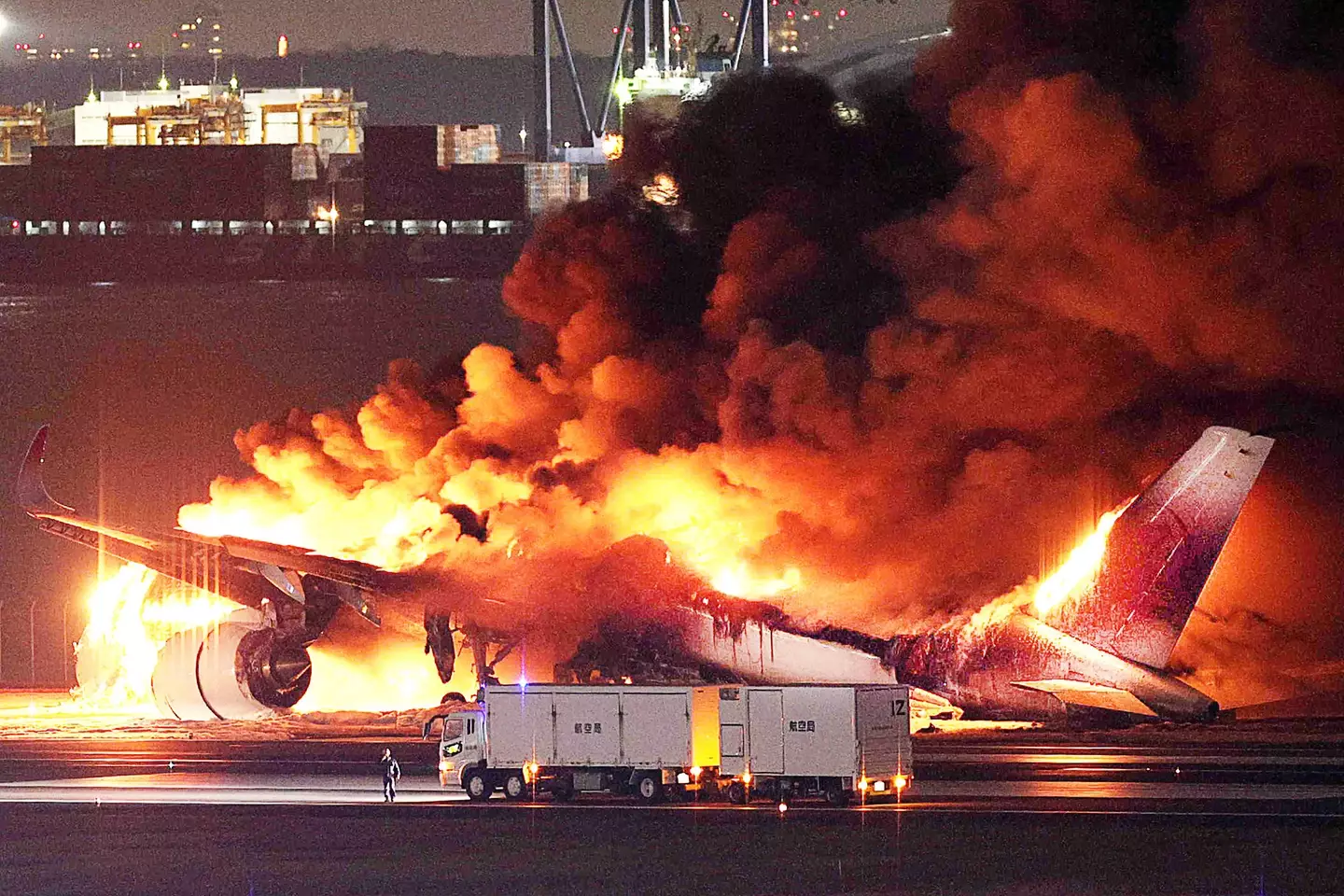 379 passengers and crew were evacuated from the plane as it caught fire.