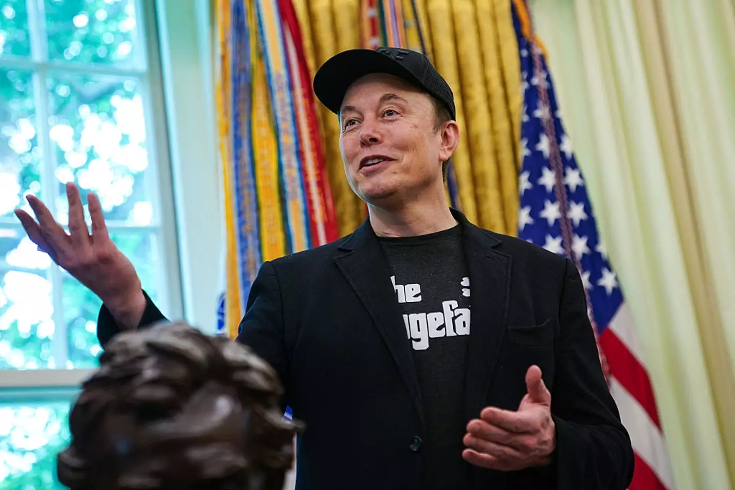 $1 trillion is a crazy amount of money but could be Musk's if he hits all his targets. (ALLISON ROBBERT/AFP via Getty Images)