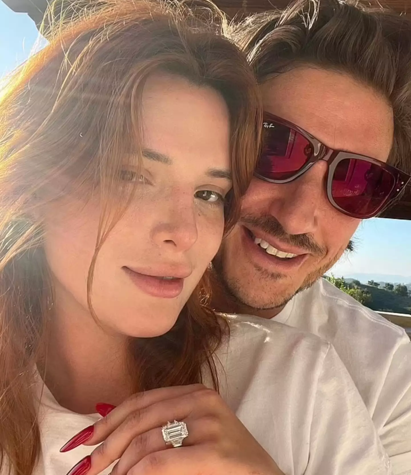 Thorne seen flashing her blingy engagement ring after accepting Emms' proposal (Instagram/@bellathorne)