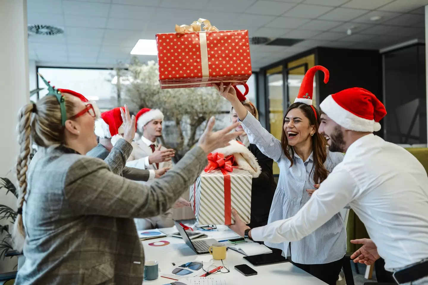 Legally, companies aren't allowed to enforce Secret Santa on their employees (Getty Stock Image)