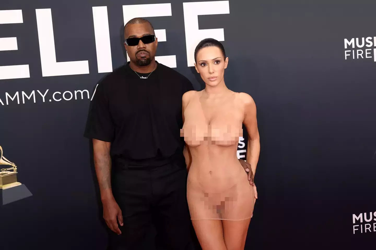 A lip reader has said that Kanye West helped coordinate his wife's dress reveal. (Matt Winkelmeyer/Getty Images for The Recording Academy)