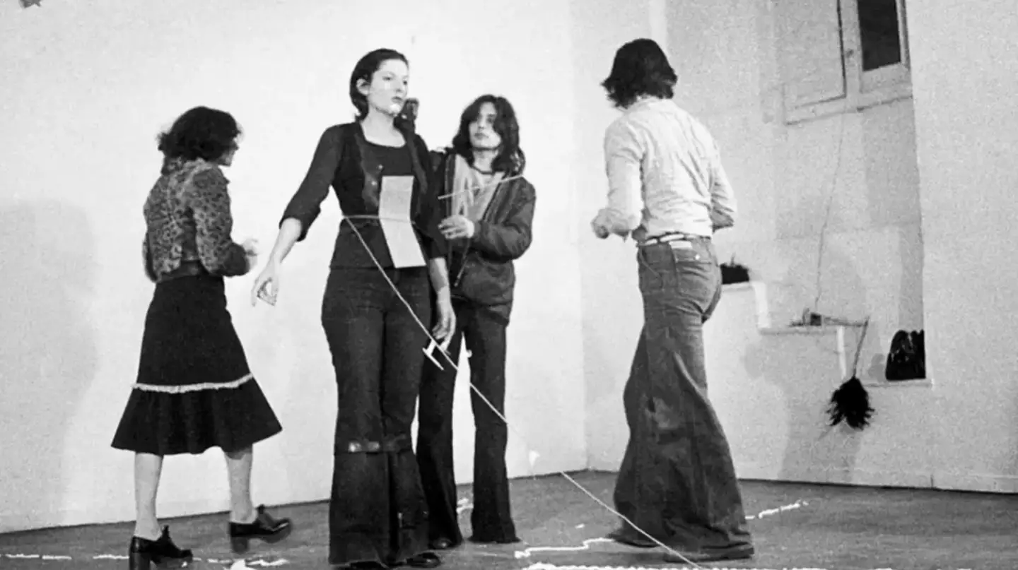 Abramović is famous for pushing performance art to its limits, most famously with 'Rhythm 0' (Marina Abramović Institute/YouTube)