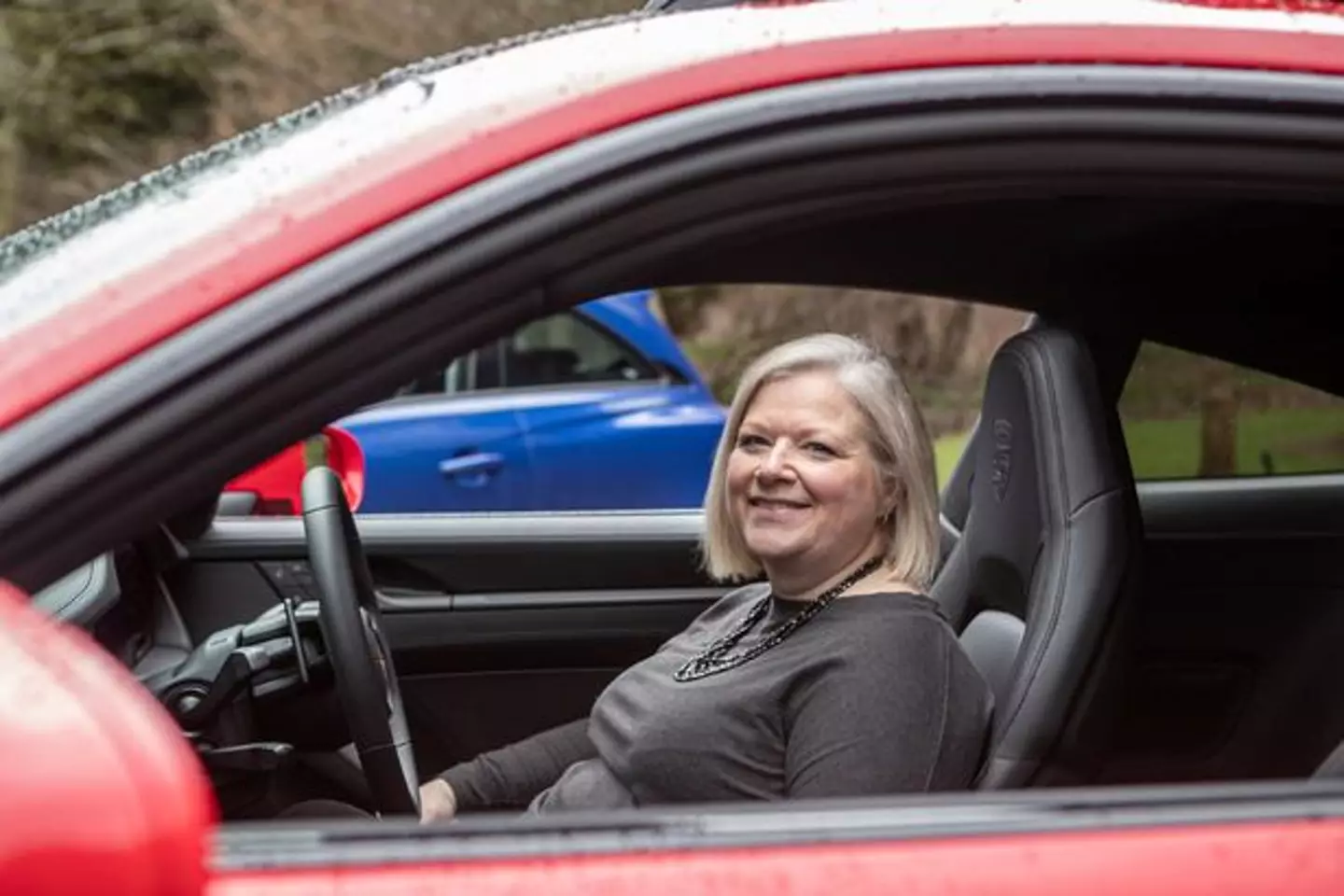 Joanne McGuigan, 49, won the red supercar but has decided not to keep it.