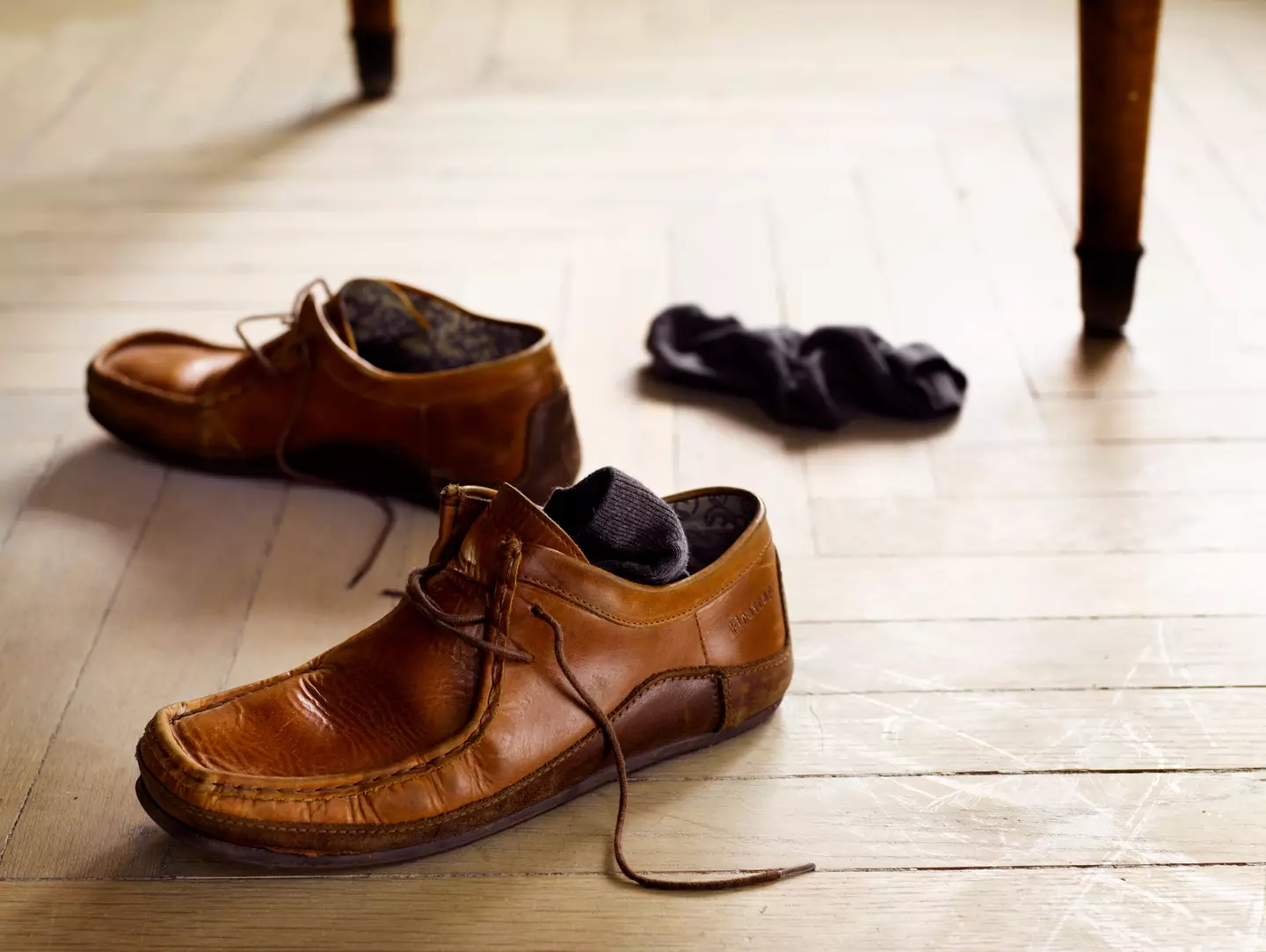 "Yes, the shoes are under the table but I'll need them again soon so in a while they won't be." (Getty Stock Photo)
