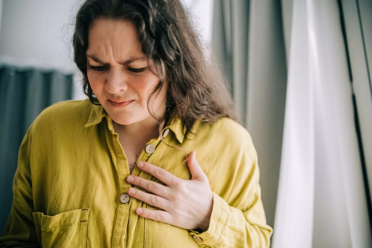 Make sure you check in with your doctor if you've got any concerns about your chest (Getty Stock Image)