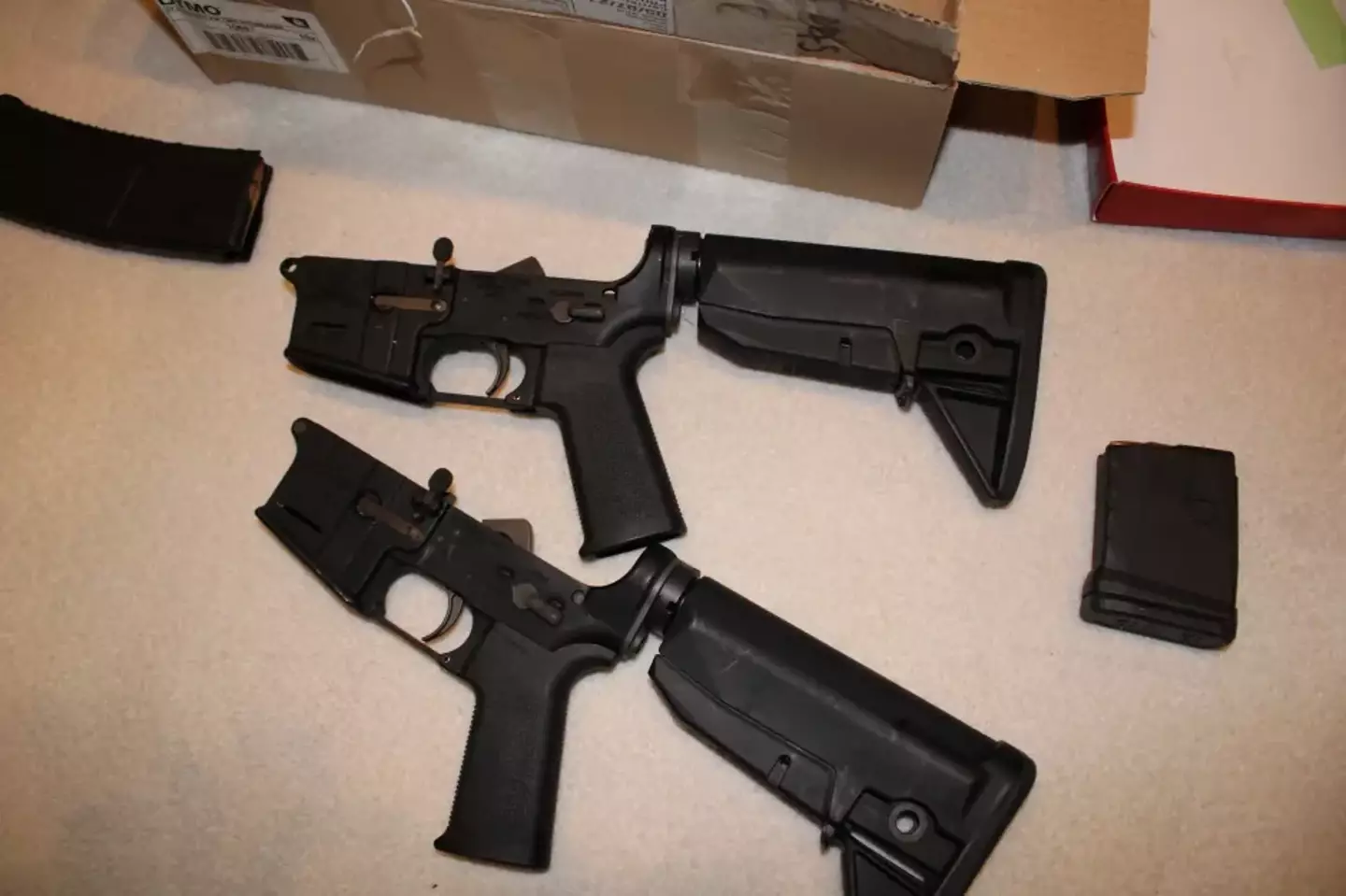 Special Agent Gerard Gannon testified that federal agents found high-powered firearms during the raids (DOJ)