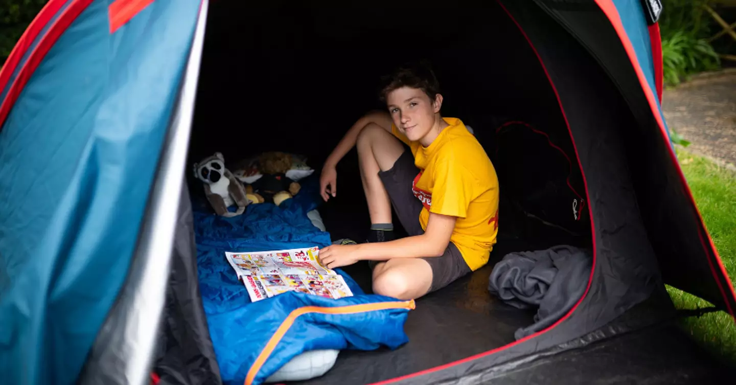 Max has been sleeping outside in a tent for the last three years.