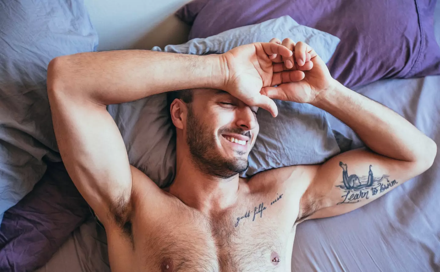 Blokes with a 'hung smile' supposedly give off the vibes that they have a massive penis (Getty Stock Image)