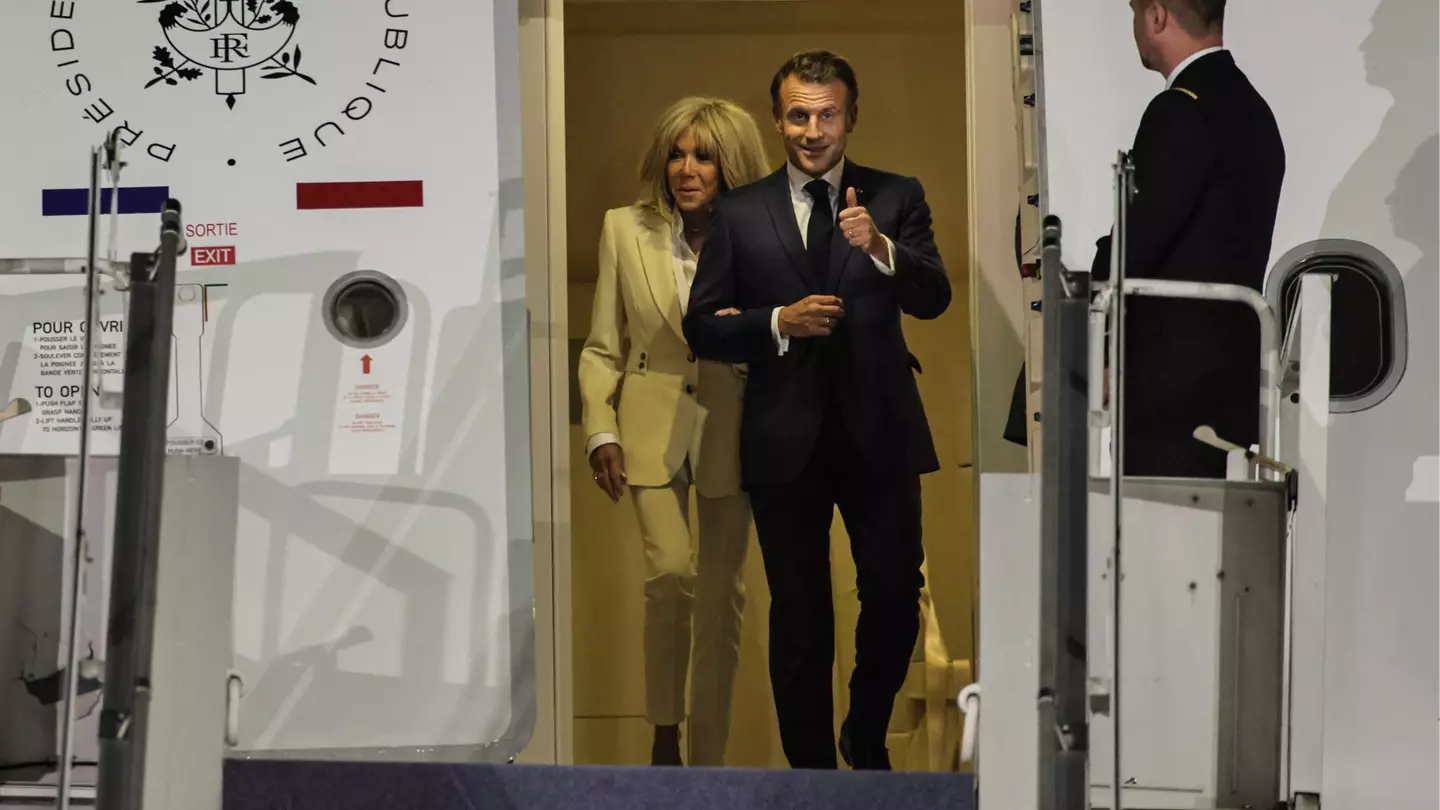 Emmanuel Macron responded after wife 'pushed him in face' as lip-reader 'reveals' what she said moments after