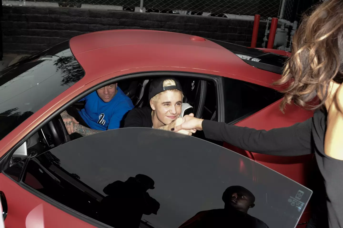 Biebz does love a Ferrari. (Allen Berezovsky/Getty Images)