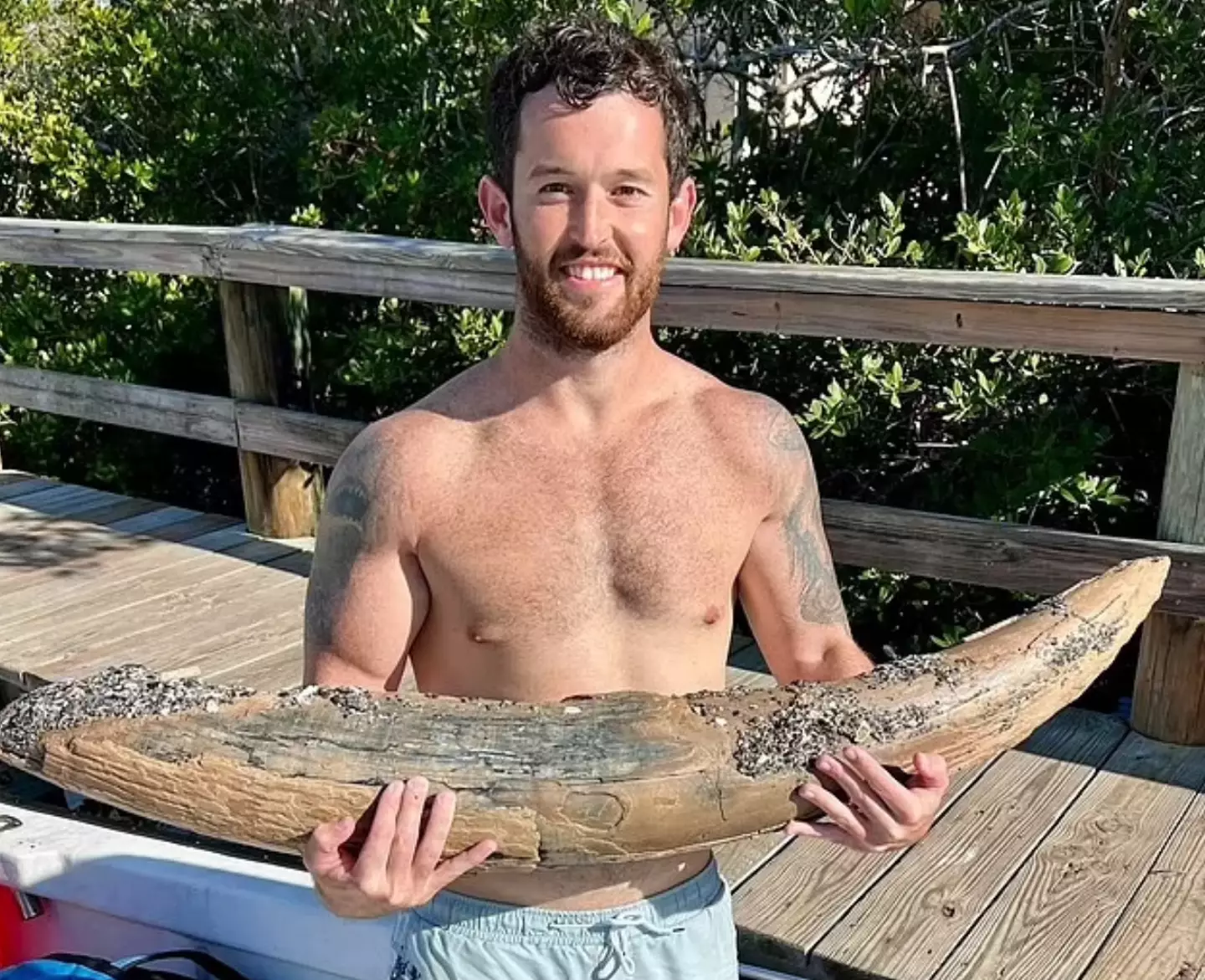 The Mastodon tusk weighs roughly 60lbs and was found 25 feet underwater. (Facebook/Blair Marlow)